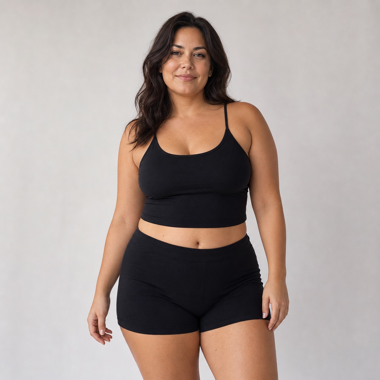 Adult model wearing a dark built-in cotton top